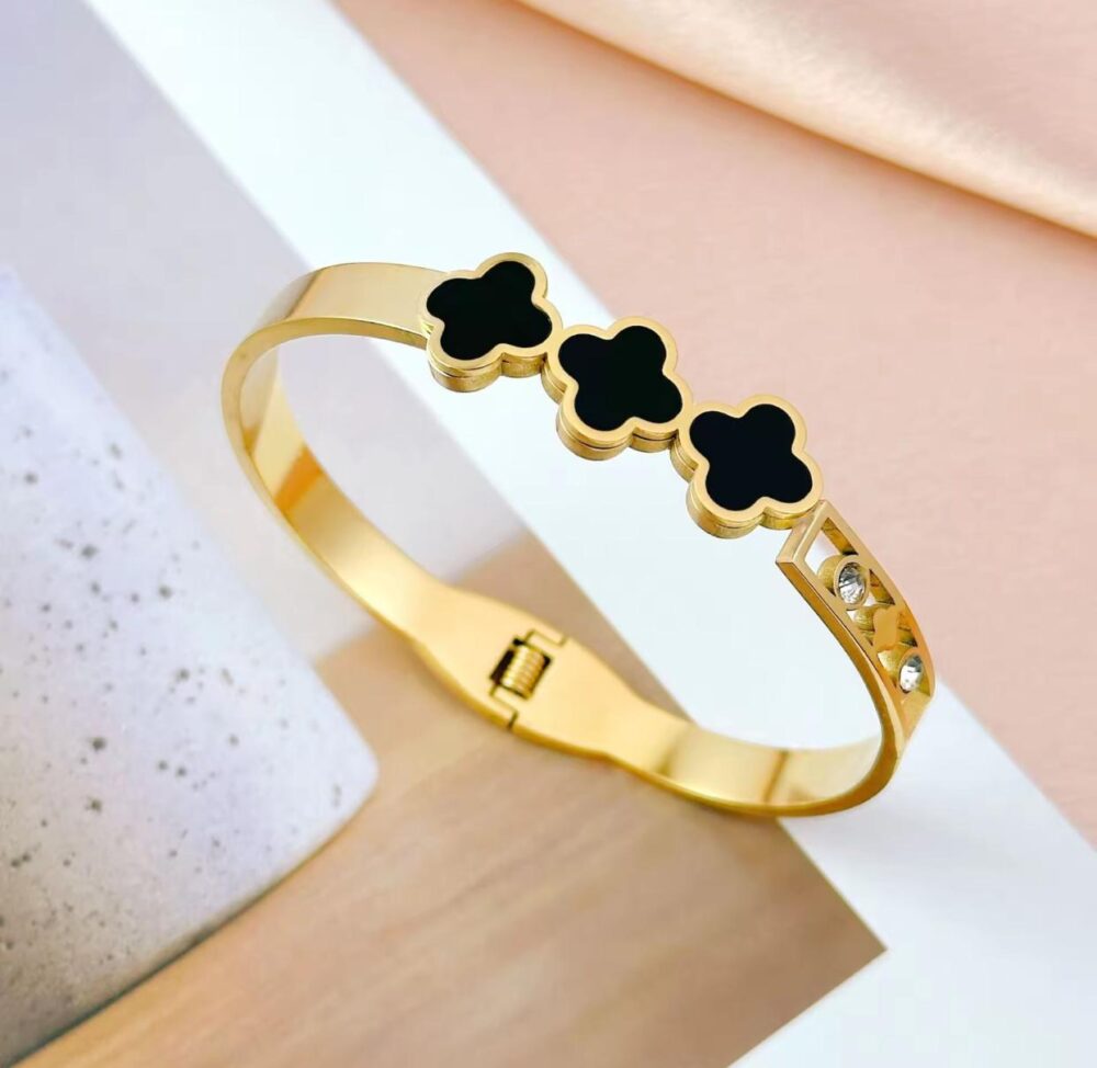Luxury Gold Clover Bracelet with Black Enamel & Diamond Accents – Elegant Designer-Inspired Bangle for Women & Girls