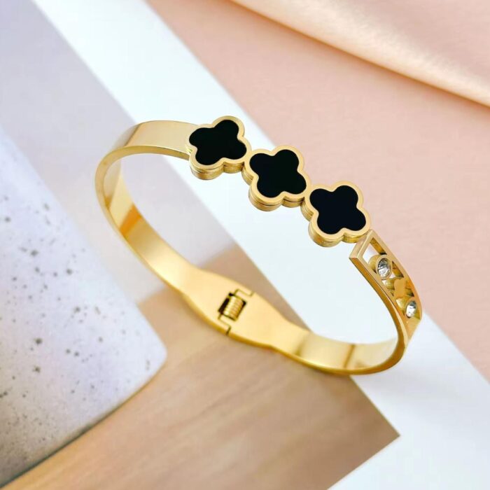 Luxury Gold Clover Bracelet with Black Enamel & Diamond Accents – Elegant Designer-Inspired Bangle for Women & Girls